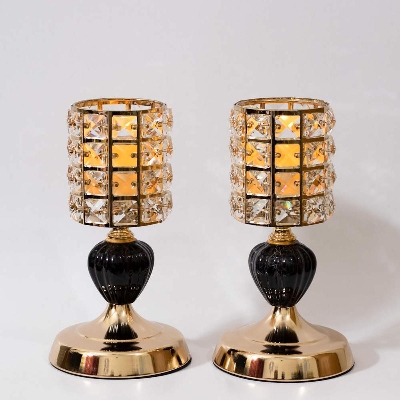 Picture of Diamond Cut Stone Design Golden Color Metal Body Black Stand Candle Holder