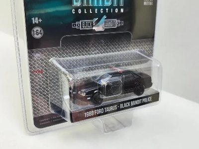 Picture of GreenLight 1:64 1988 Ford Taurus Black Alloy model diecast car