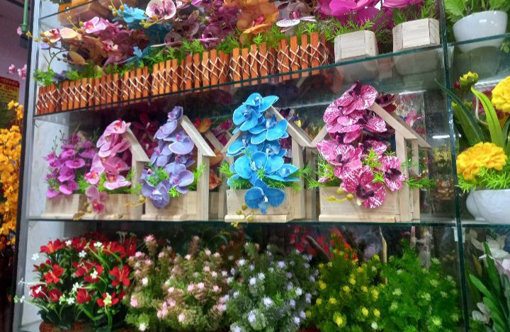Buy    Artificial orchid flowers in the wooden house tab. - Vintage Choice - Expression of Yourself at Best Prices in Bangladesh