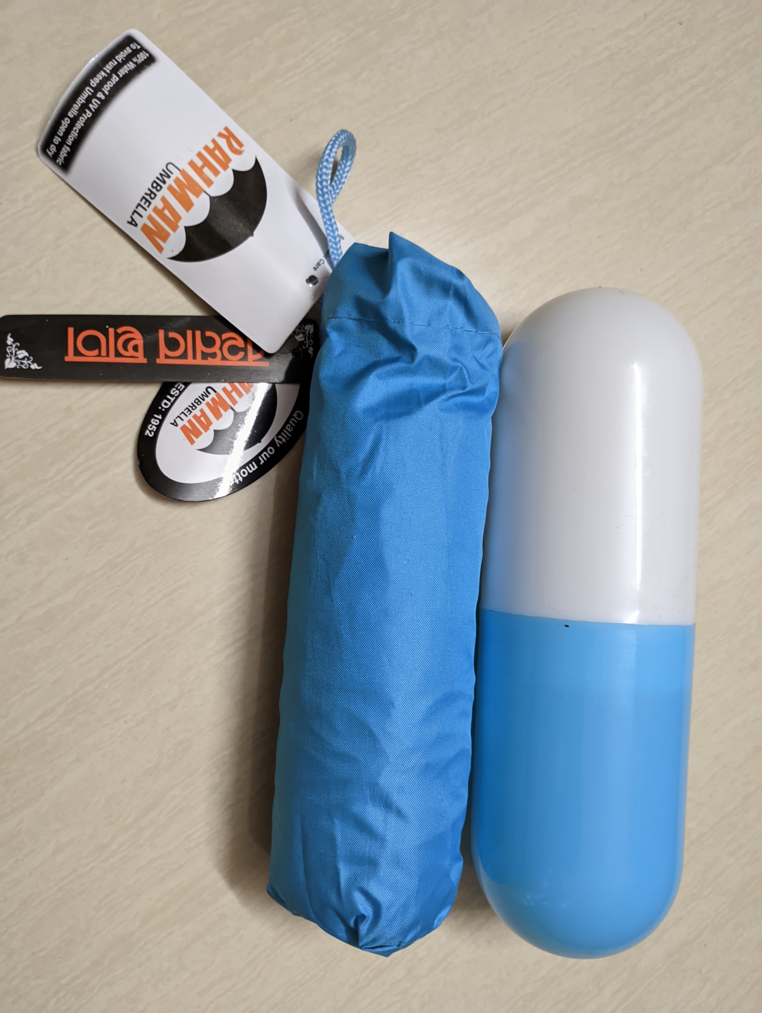 Picture of 7 inch Mini Folding Capsule Umbrella With Cute Capsule Case -Multi Color