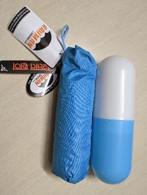 Picture of 7 inch Mini Folding Capsule Umbrella With Cute Capsule Case -Multi Color