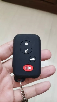 Picture of Toyota Silicone Protecting Remote Key Case Cover 4 Buttons For Holder for Land Cruiser, Highlander ,Crown, Prado, Allion, Camry, Avenza, Premio, Prius (Black with Red Button)