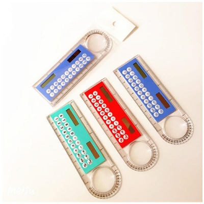 Picture of 10 cm ruler calculator magnifier glass solar function calculator computer