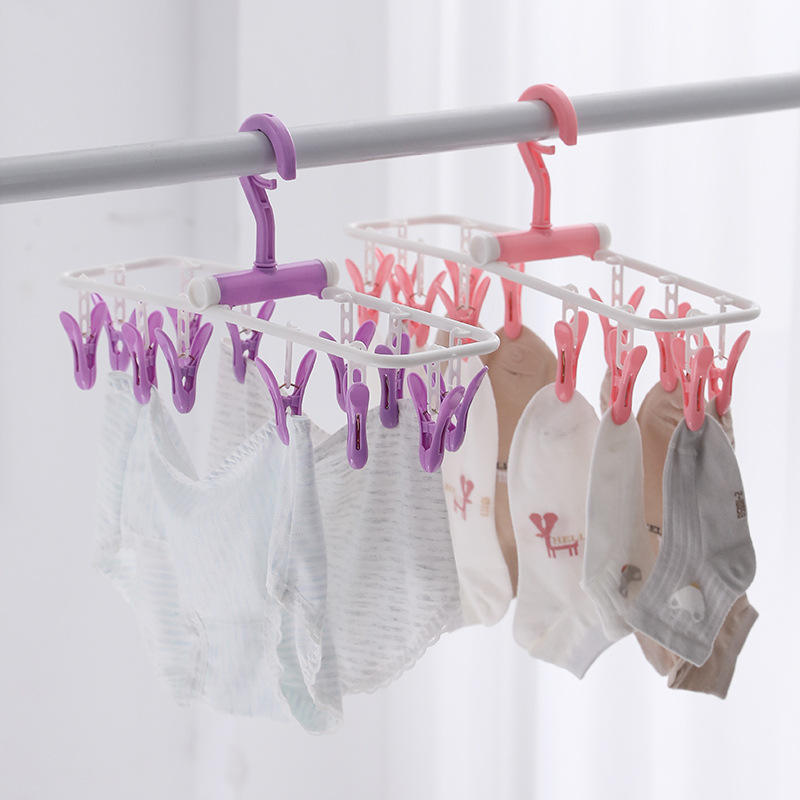 Picture of Folding plastic clothes hanger pegs with 12 clips socks drying hanger set