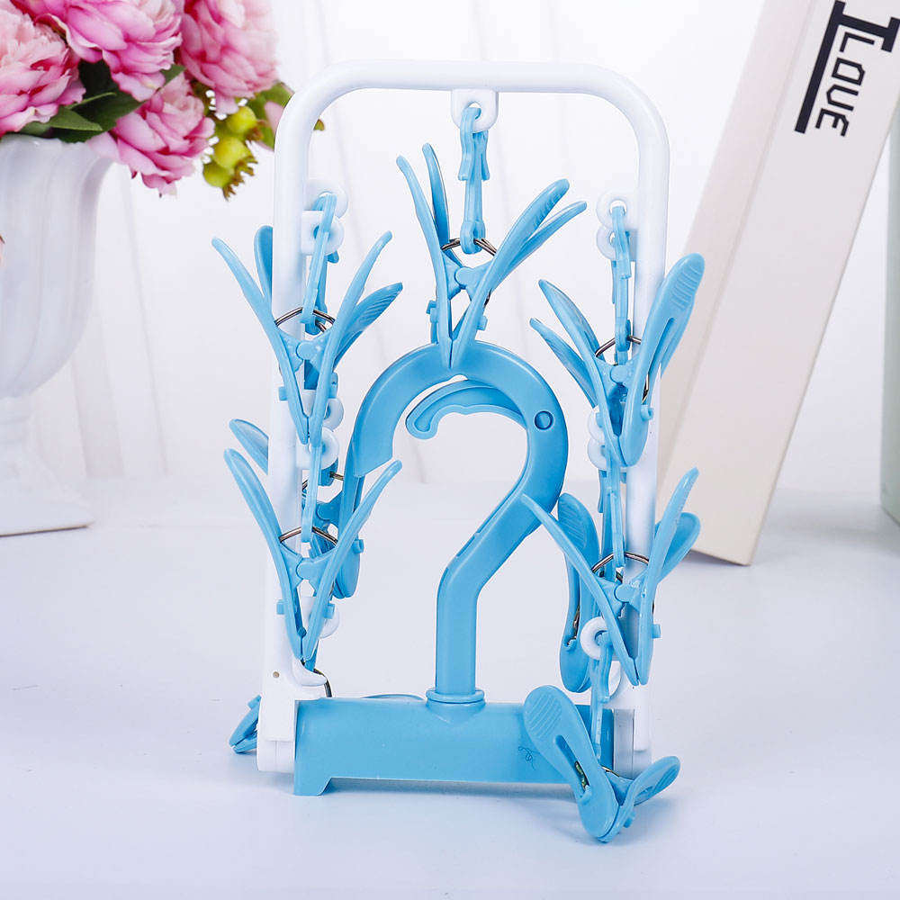 Picture of Folding plastic clothes hanger pegs with 12 clips socks drying hanger set
