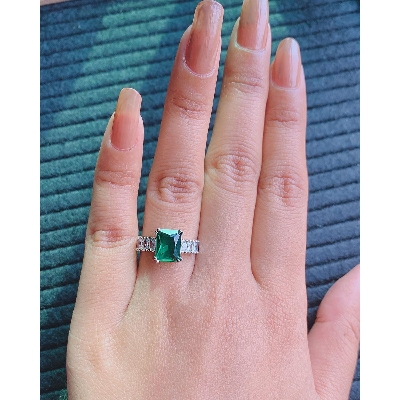 Picture of Emerald Cut Eternity Green Stone Wedding Ring