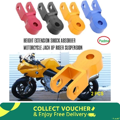 Picture of Motorcycle Height Extension Gulti Shock Absorber. Jack Up Riser Suspension for bike. Golden color