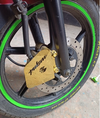 Picture of Bajaj Pulsar Motorcycle Hydraulic Cover Golden Color