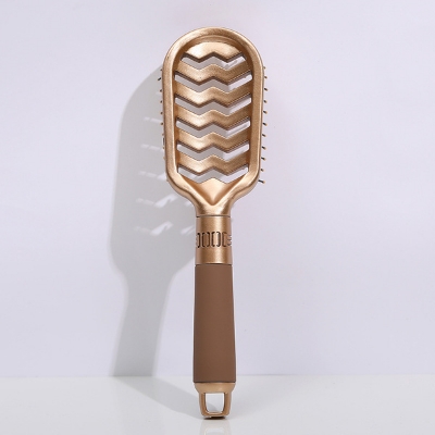 Picture of Golden hollow wavy lady temperament, home massage comb, wet and wet, dual -use, hair styling combed combing Fashion Paddle Hair Comb-1pcs