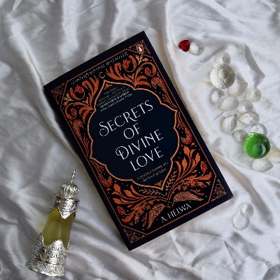 Picture of Secrets of Divine Love : A Spiritual Journey into the Heart of Islam by A. Helwa