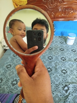 Picture of Modern wooden hand mirror 9"inch by 4.1/2"inch