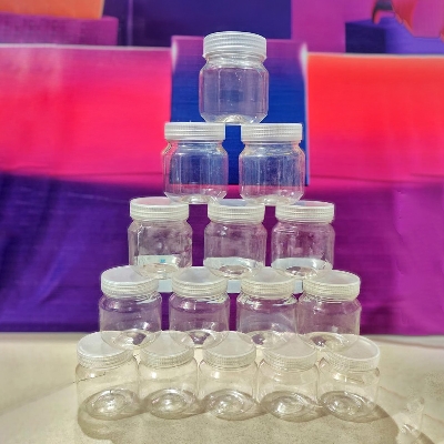 Picture of Store Small Items With This Set Of 100Ml Transparent Plastic Jars- Comes In A Multicolor Set Of 12 Pieces For Versatile Use