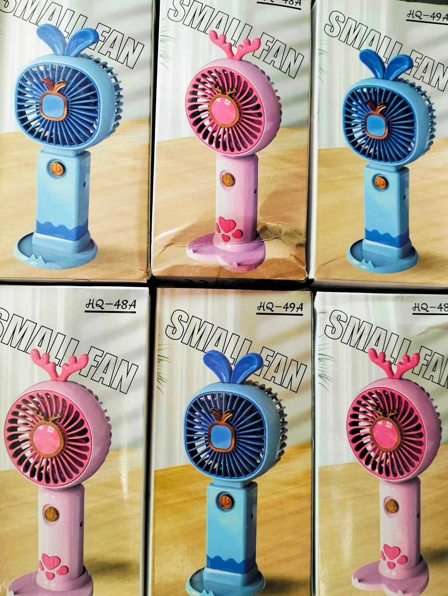 Picture of portable handheld small fan with mobile holder - Multicolor
