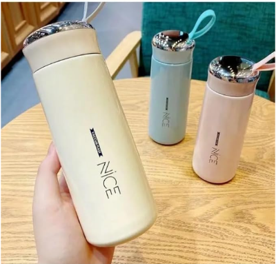 Picture of Water Bottles for Offices and Kitchen Inner Glass and Outer Plastic Layer Hot and Cold Water Bottle, Water Storage and Also use