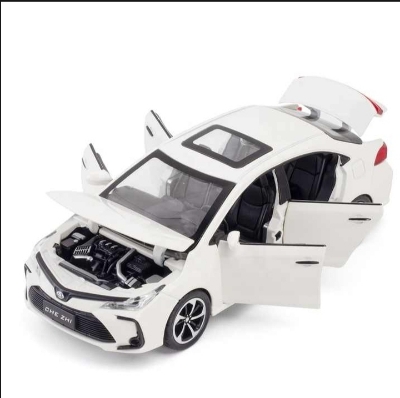 Picture of Toyota Corolla 1:32 Die Cast WHITE Model Car. Light Music & Pull Back Fiction with box Made By CHE ZHE