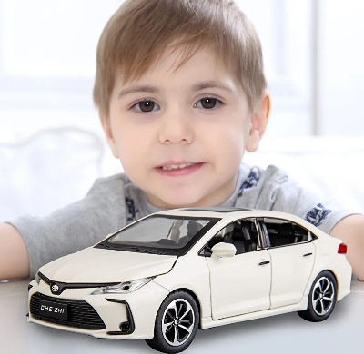 Picture of Toyota Corolla 1:32 Die Cast WHITE Model Car. Light Music & Pull Back Fiction with box Made By CHE ZHE