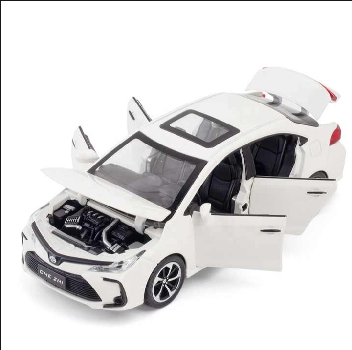 Picture of Toyota Corolla 1:32 Die Cast WHITE Model Car. Light Music & Pull Back Fiction with box Made By CHE ZHE