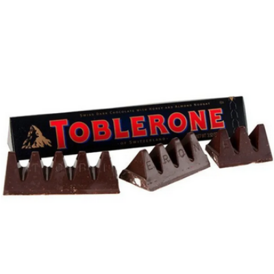 Picture of Toblerone Swiss Dark Chocolate with Honey and Almond Nougat, 100g Bar (Pack of 20) uk