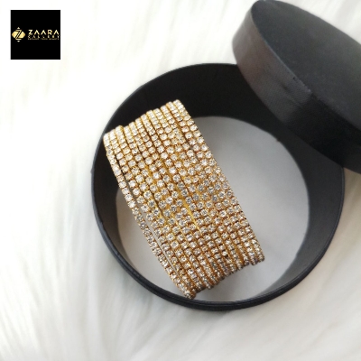 Picture of Golden Metal & White Stone Bangles for Women 12 Pieces (Imported) M-ST2200GOLDWHITE - Bangles