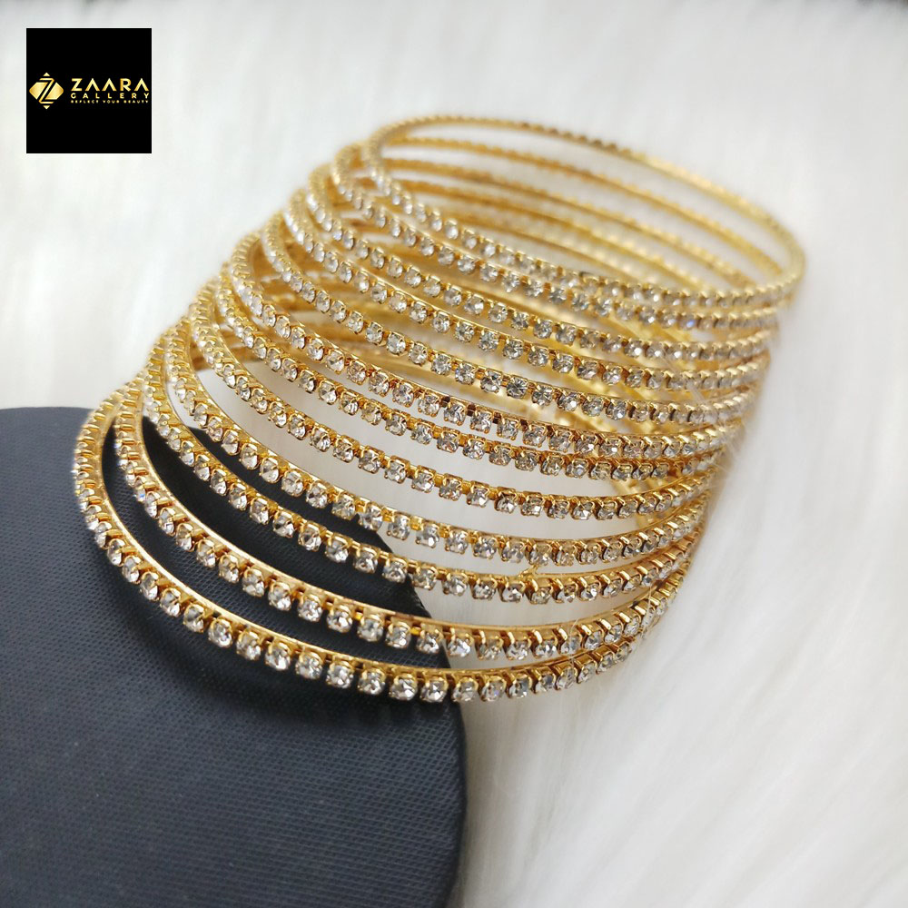 Picture of Golden Metal & White Stone Bangles for Women 12 Pieces (Imported) M-ST2200GOLDWHITE - Bangles