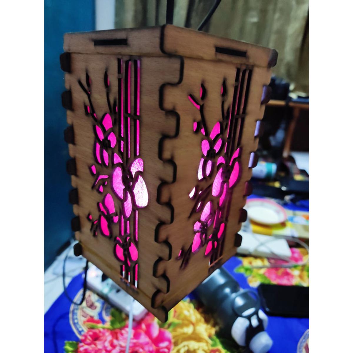 Picture of wooden hanging lamp with lighting for decorative look