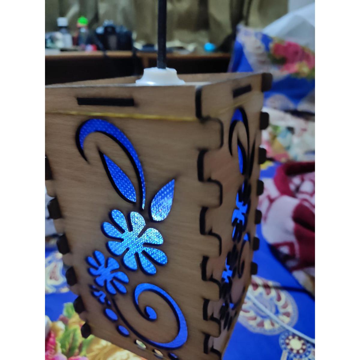 Picture of wooden hanging lamp with lighting for decorative look