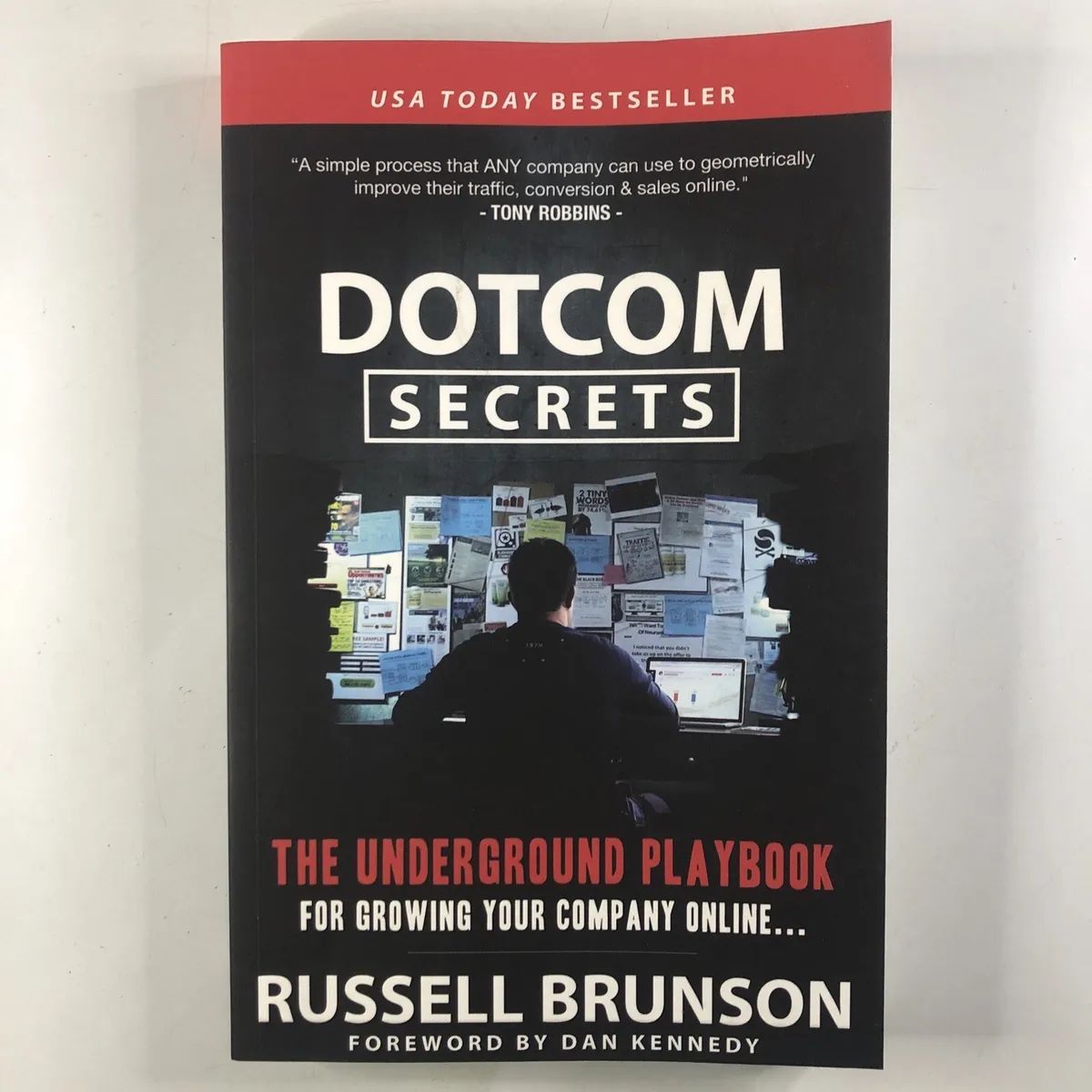Picture of Dotcom Secrets: The Underground Playbook for Growing Your Company Online with Sales FunnelsBook by Russell Brunson (Paperback)