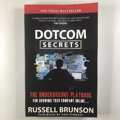 Picture of Dotcom Secrets: The Underground Playbook for Growing Your Company Online with Sales FunnelsBook by Russell Brunson (Paperback)