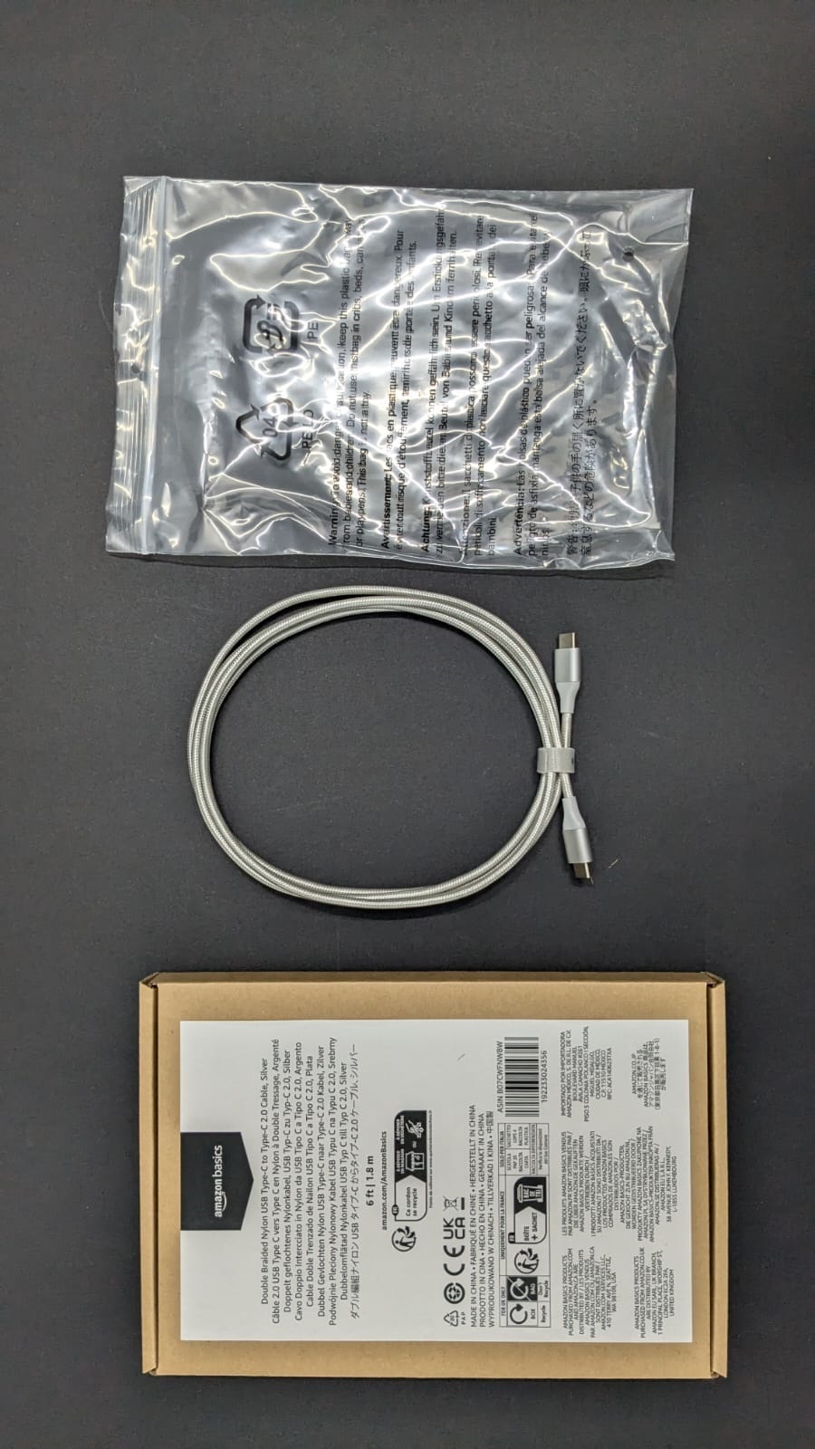 Picture of Amazon Basics USB-C to USB-C 2.0 Fast Charger Cable, Nylon Braided Cord, 480Mbps Speed, USB-IF Certified, for Apple iPhone 15, iPad, Samsung Galaxy, Tablets, Laptops, 6 Foot, Silver