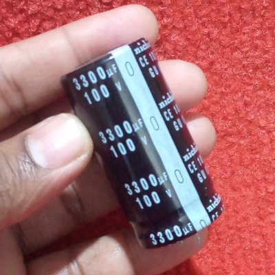 Picture of 3300uF 100V RADIAL Electrolytic Capacitor 3300uF 100V Radial Polarized Aluminum Electrolytic Capacitors 2 Pin Leads Connections Leg