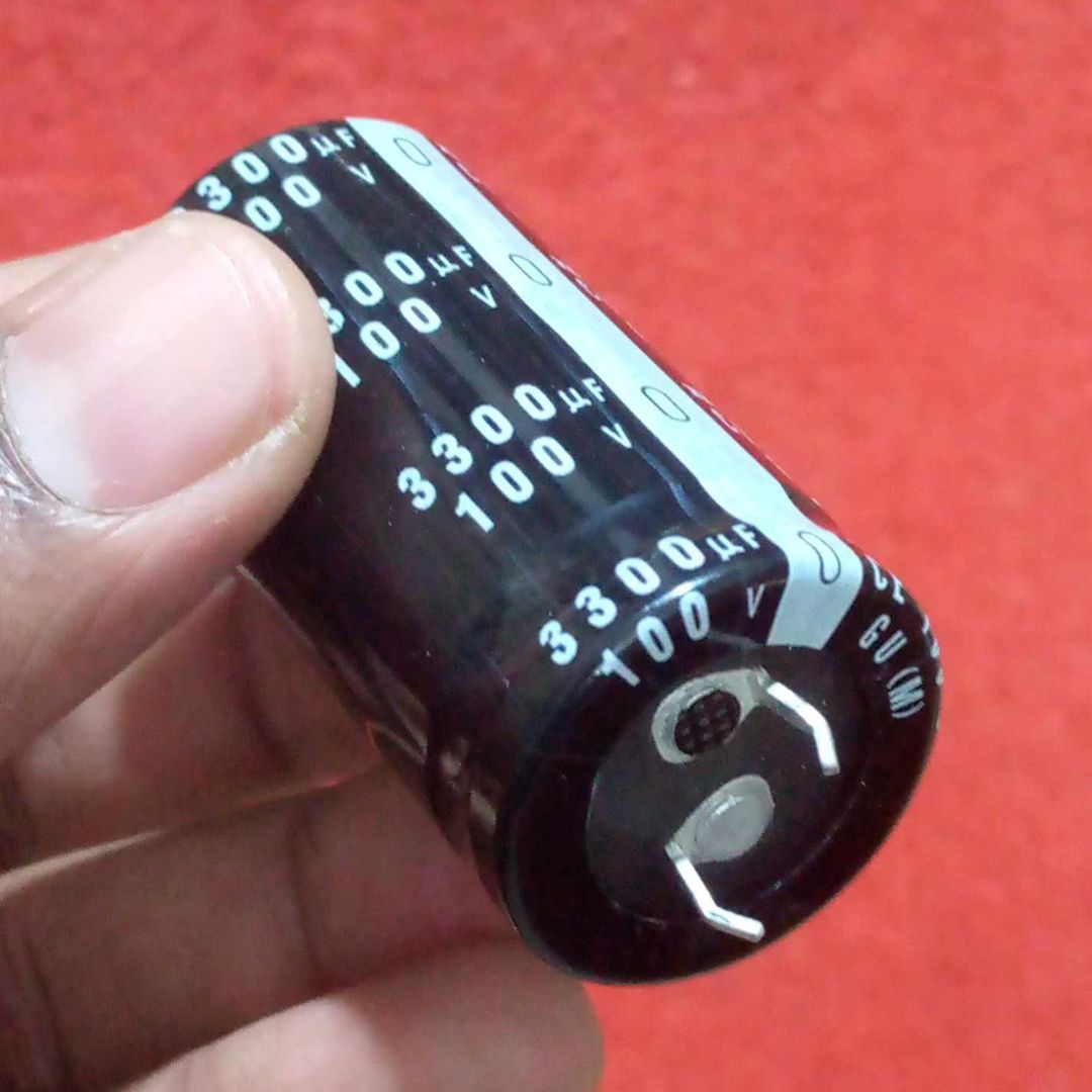 Picture of 3300uF 100V RADIAL Electrolytic Capacitor 3300uF 100V Radial Polarized Aluminum Electrolytic Capacitors 2 Pin Leads Connections Leg