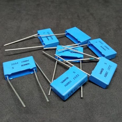 Picture of 5Pcs- BLUE BOX Type 223j 1000V Capacitor 22nF 223j 1000V Polypropylene Metal Film Capacitor Axial Film Molded Capacitors 2 Pin Leads Terminals Connections Leg