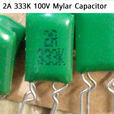 Picture of 10Pcs - MYLAR 2A333K 100V GREEN Color Mylar Polyester  Film Capacitor 33nF Polypropylene Capacitors 2 Pin Leads Terminals Connections Leg