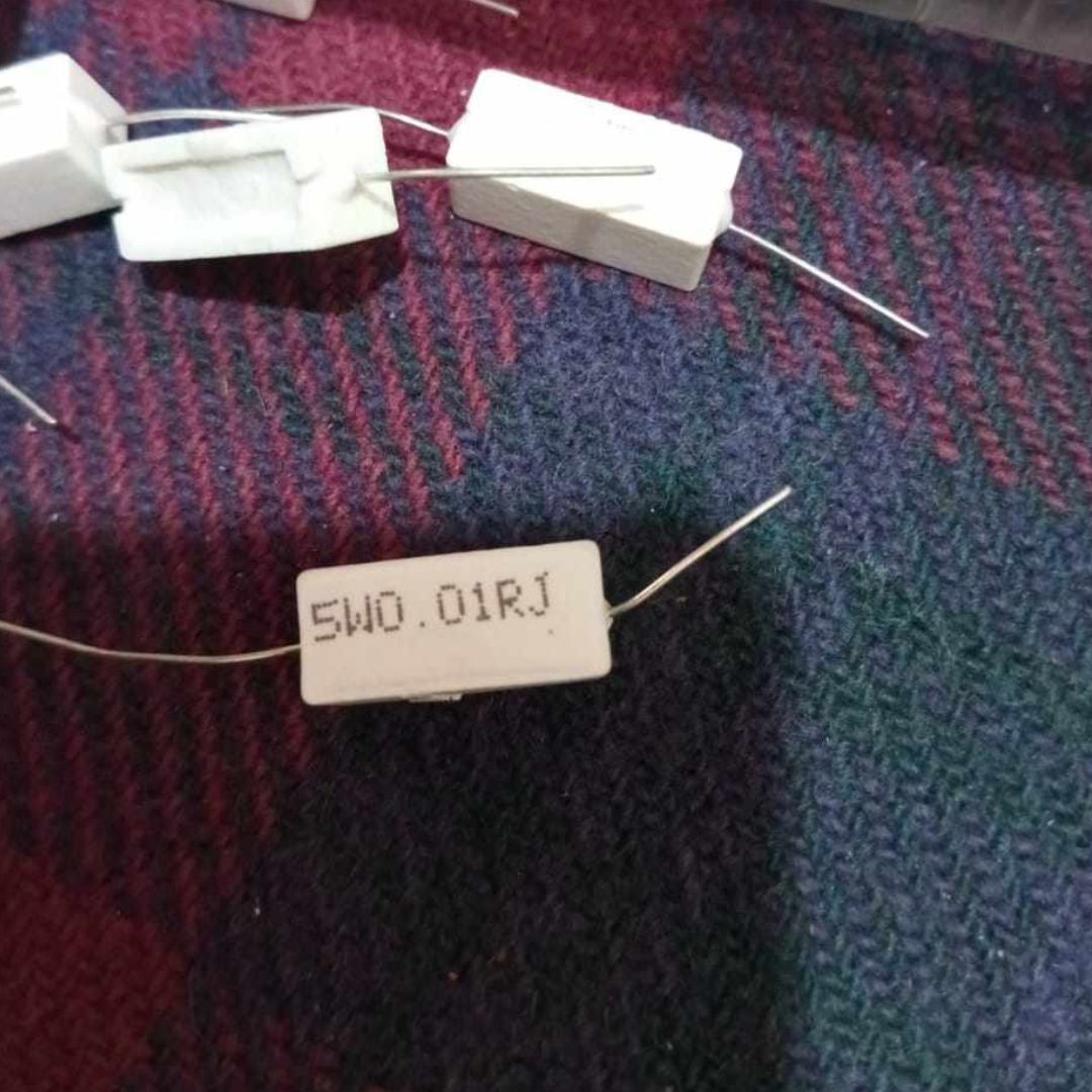 Picture of 5Pcs- 5Watt 0.01 Ohm WIREWOUND 5W 0.01 Ohm Ceramic Cement Power Wirewound Resistor 0.01 Ohm 5Watt Wire Wound 2Pin Leads Fixed Cement Resistor 5% Tolerance