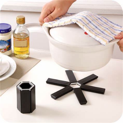 Picture of Foldable Pan Mat Heat-insulated Anti-slip Anti-scald Black Hollow Heat-insulated Portable Pan Pad Placemat Kitchen Accessories-Black