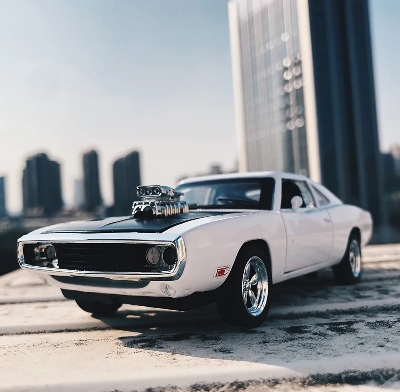 Picture of 1:32 Dodge Charger Fast & Furious Die Cast Model Car. Pull Back Fiction & Light Music.