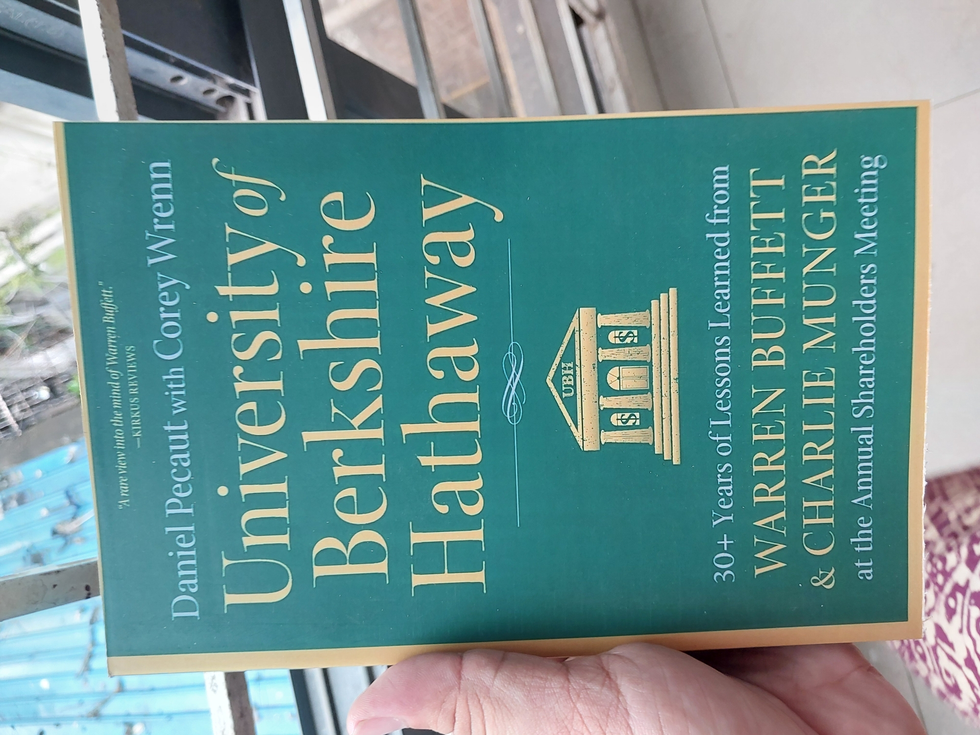 Picture of University of Berkshire Hathaway: 30 Years of Lessons Learned from Warren Buffett & Charlie Munger at the Annual Shareholders Meeting -Paperback