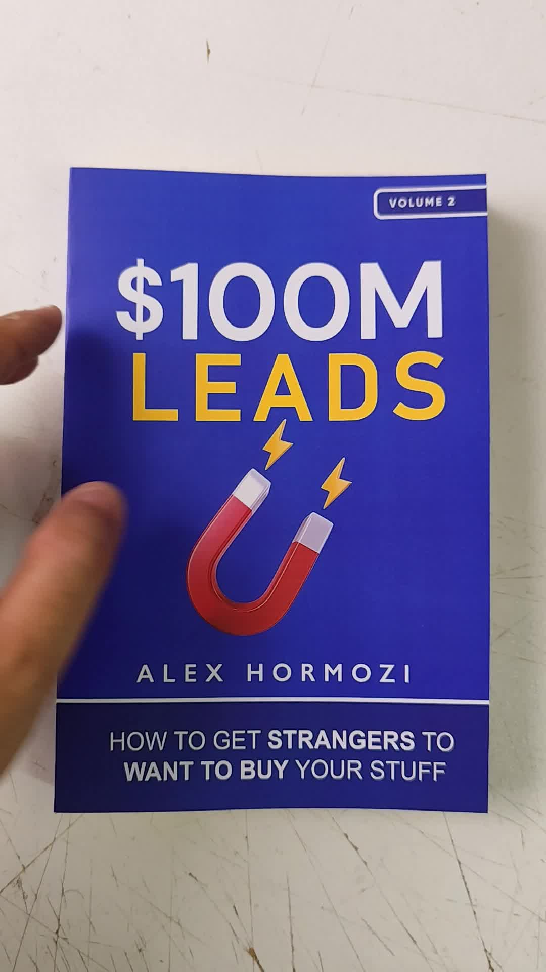 Picture of $100M Leads: How to Get Strangers to Want to Buy Your Stuff Book by Alex Hormozi