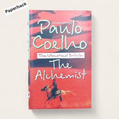 Picture of The Alchemist Novel by Paulo Coelho (Yellowish -Paperback)