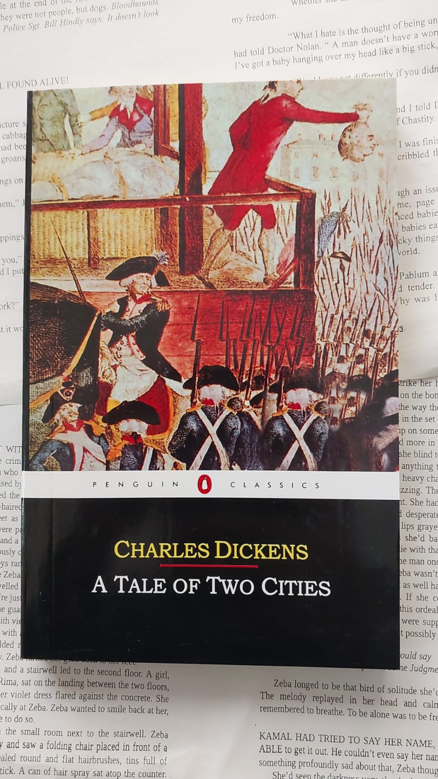 Picture of A Tale of Two Cities Novel by Charles Dickens (Yellowish - Paperback)