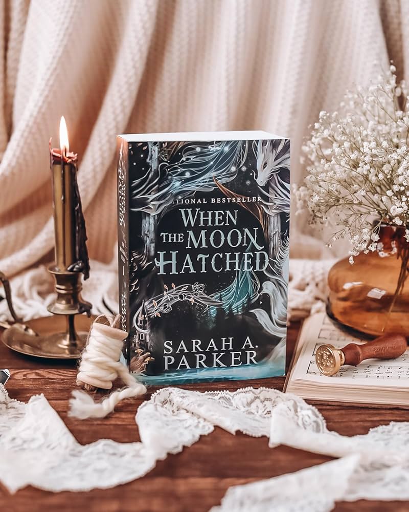 Picture of When the Moon Hatched: A Fast-Paced Romantasy with Undeniable Chemistry in a Stunning Immersive World by Sarah A. Parker