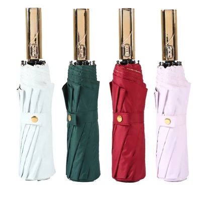 Picture of Luxury 10 Ribs Automatic 3 Folding Umbrella Titanium Gold Sunshade Umbrella with Gold Metal Handle