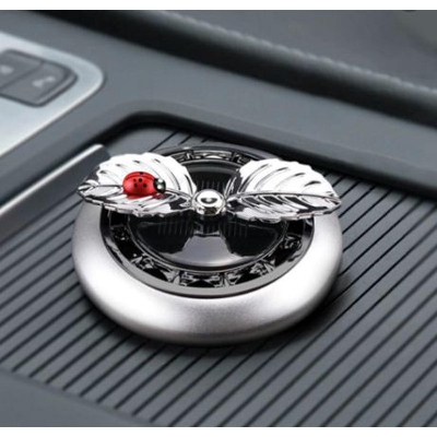 Picture of Car Perfume Ornaments Creative Solar Rotation Leaf Car Aromatherapy Air Fresher Alloy Fragance Diffuser Car Decoration
