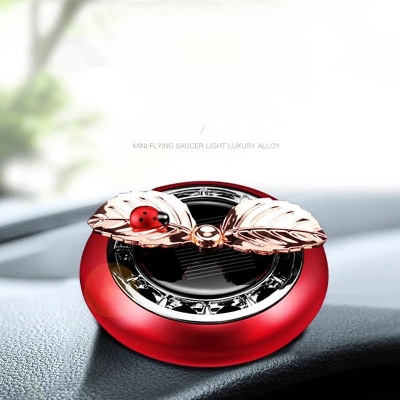 Picture of Hot Car Perfume Ornaments Creative Solar Rotation Leaf Car Aromatherapy Air Fresher Alloy Fragance Diffuser Car Decoration