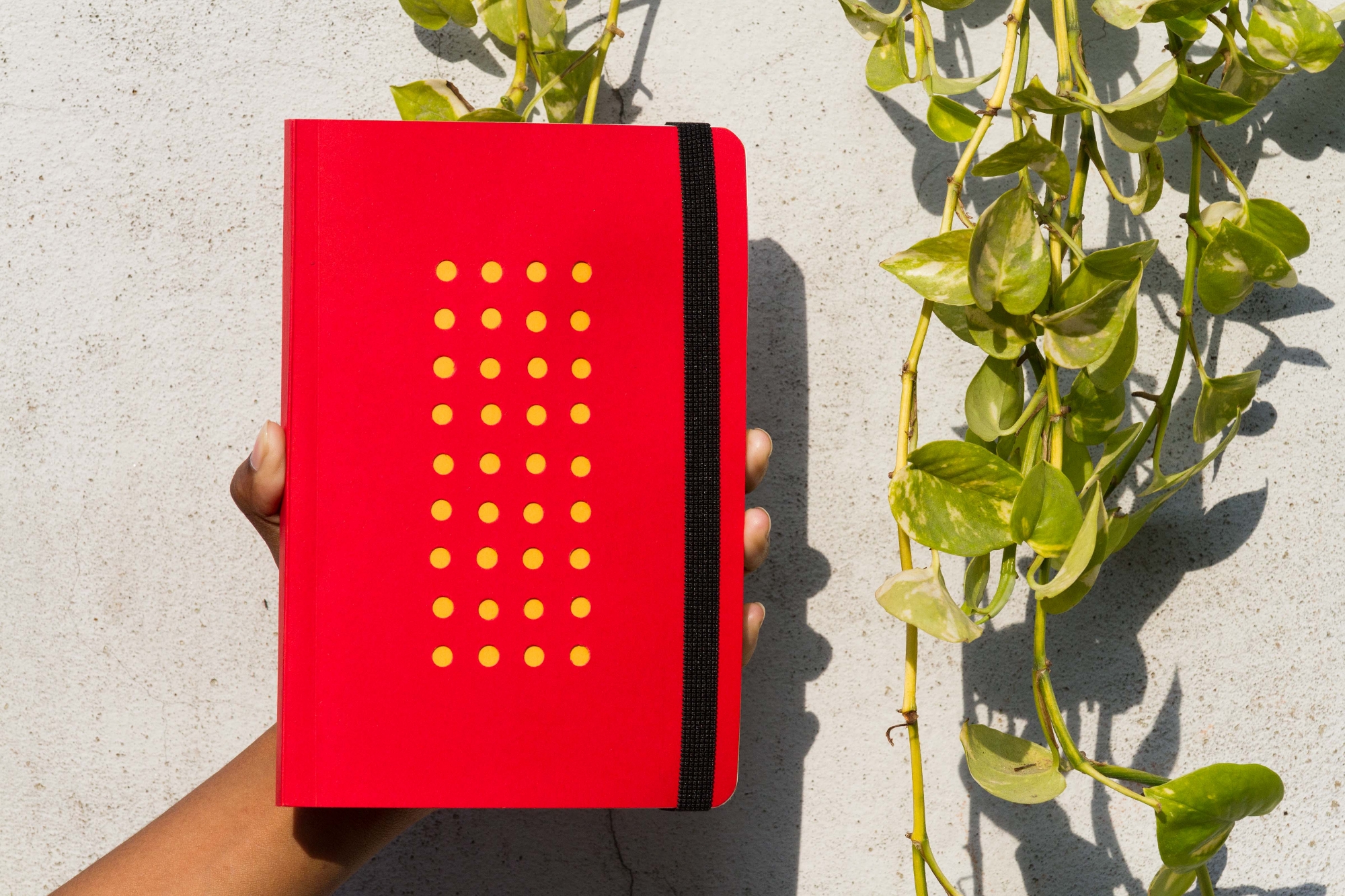Picture of Daily Journal Red (Punch-Yellow) Dotted Grid Notebook with Elastic Band