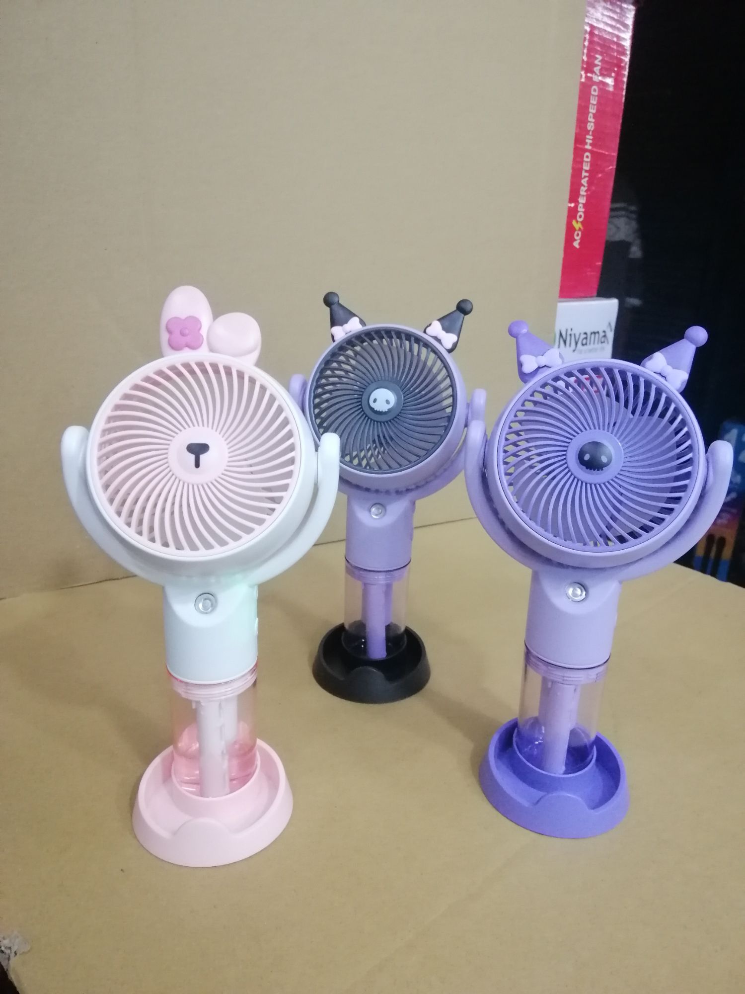 Picture of Handheld and Travel-friendly USB Rechargeable Mini Fan with popular cartoon shape