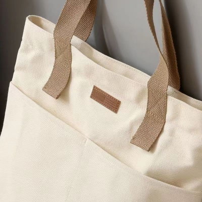 Picture of TAG Lifestyle Canvas Tote Bag/Fashionable Top Handle Off White Color With 2 Big Outside Pocket and Zipper Enclosure for girls For University/College/Trendy Fashionable Women