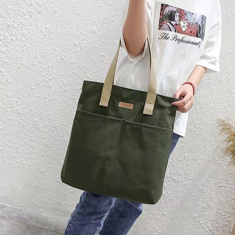 Picture of TAG Lifestyle Canvas Tote Bag/Fashionable Top Handle Olive Green Color With 2 Big Outside Pocket and Zipper Enclosure for girls For University/College/Trendy Fashionable Women