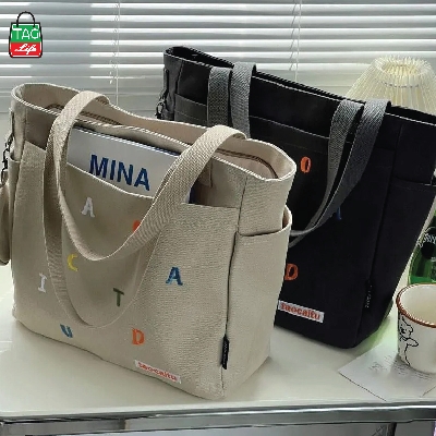 Picture of TAG Lifestyle Exclusive Design embroidery Canvas Tote Bag, Fashionable Top Handle Black Color With 4 Outside Pockets Trendy Fashionable Tote Bag for University, College Students Girls And Women