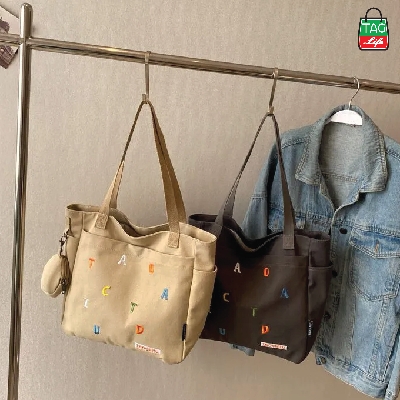 Picture of TAG Lifestyle Exclusive Design embroidery Canvas Tote Bag, Fashionable Top Handle Ash Color With 4 Outside Pockets Trendy Fashionable Tote Bag for University, College Students Girls And Women